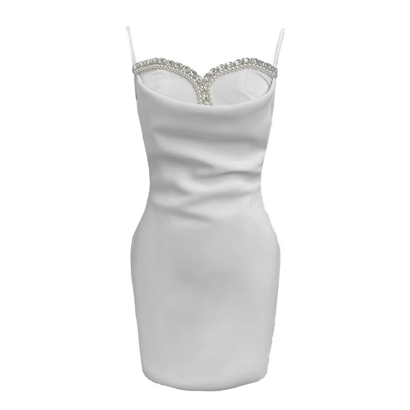 VESTIDO MINI CON ESCOTE DE PEDRERÍA