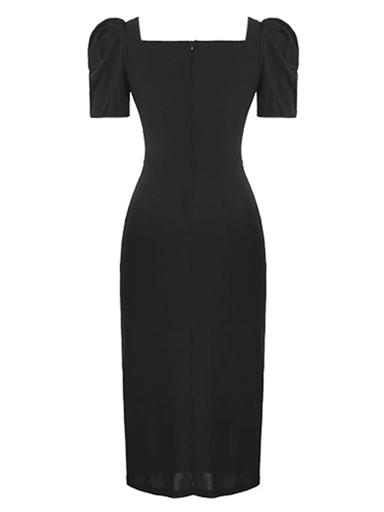 VESTIDO NEGRO CON ENCAJE Y ESCOTE CORAZÓN
