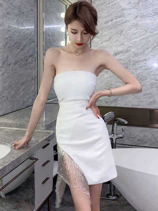 VESTIDO MINI CON FLECOS DE PEDRERÍA